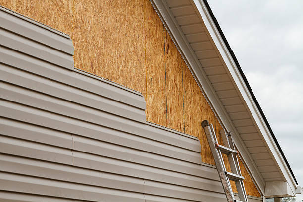 Professional Siding technician working in New Derry, PA